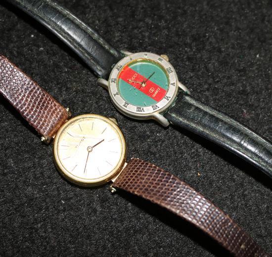 Ladies Tissot yellow gold wrist watch, with cabochon sapphire set winder and a Gucci wrist watch (2)(-)